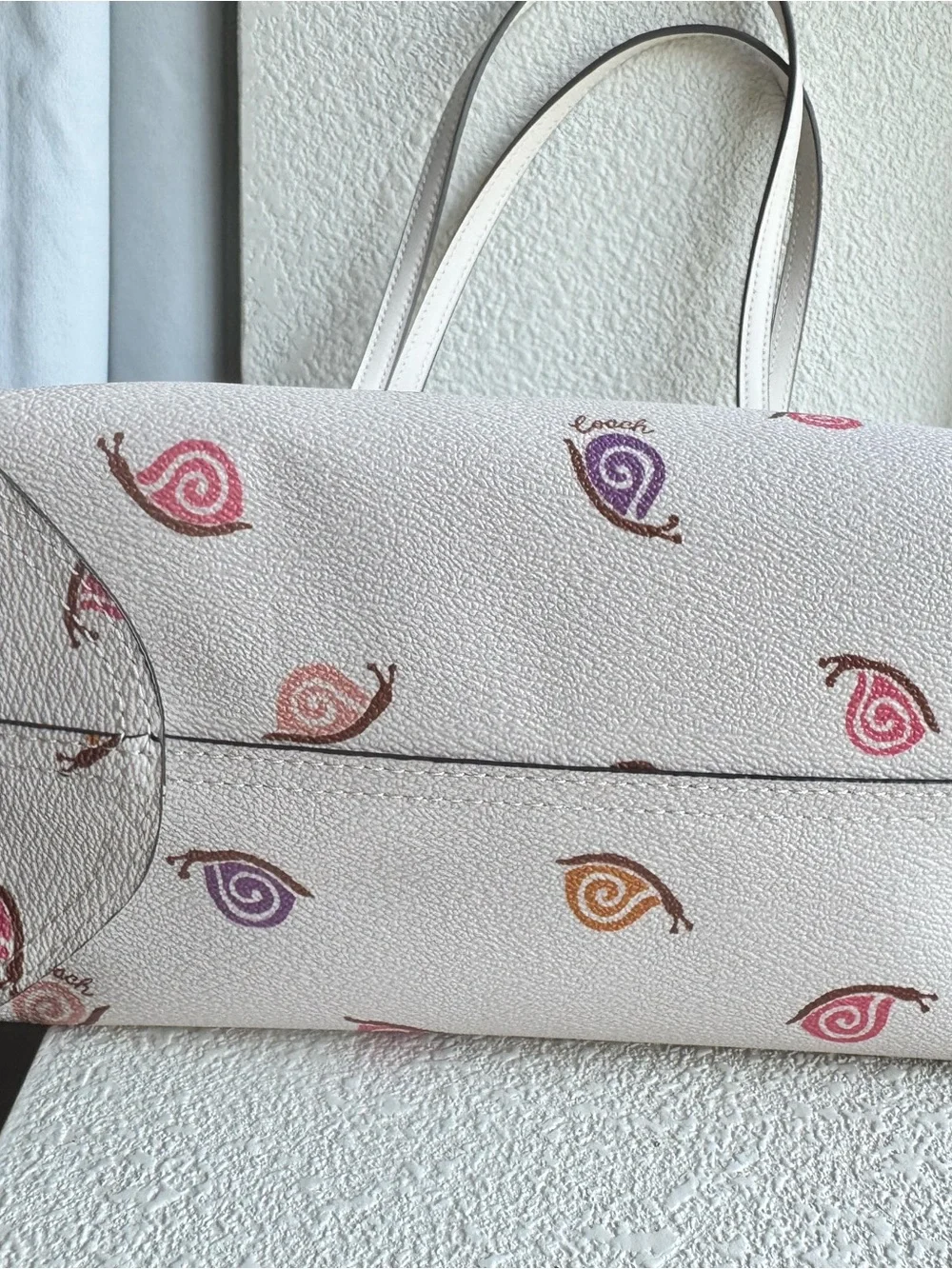Coach Cream Leather Tote with Multicolor Snail Motif